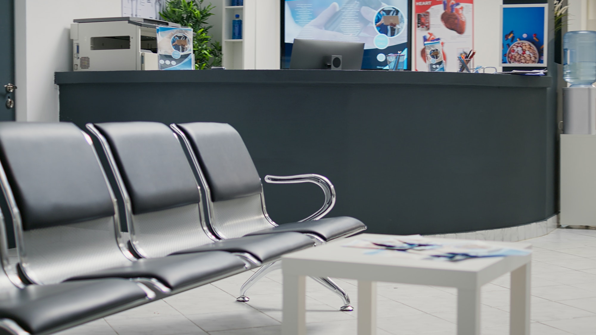 Medical clinic reception counter with waiting room in lobby